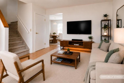 102-1835 10 Avenue Se, Calgary, AB - Indoor Photo Showing Living Room