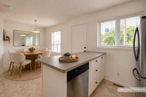 102-1835 10 Avenue Se, Calgary, AB - Indoor Photo Showing Other Room