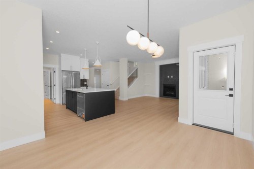 500 Rivercrest View, Cochrane, AB - Indoor Photo Showing Kitchen