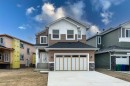 500 Rivercrest View, Cochrane, AB  - Outdoor With Facade 