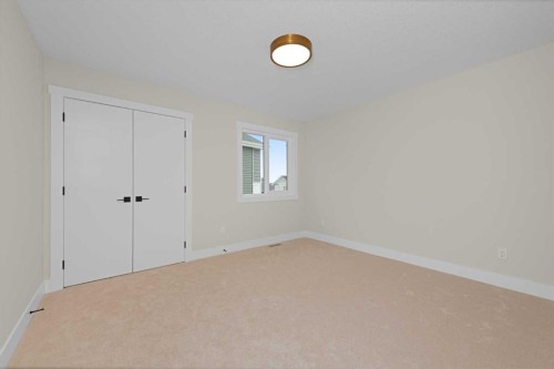 500 Rivercrest View, Cochrane, AB - Indoor Photo Showing Other Room