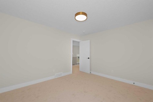 500 Rivercrest View, Cochrane, AB - Indoor Photo Showing Other Room