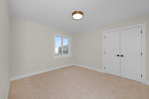500 Rivercrest View, Cochrane, AB - Indoor Photo Showing Other Room