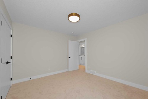 500 Rivercrest View, Cochrane, AB - Indoor Photo Showing Other Room