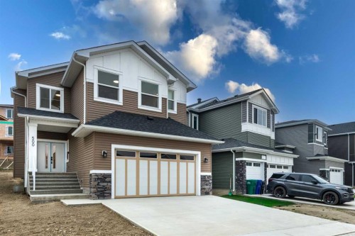 500 Rivercrest View, Cochrane, AB - Outdoor With Facade