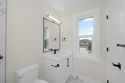 500 Rivercrest View, Cochrane, AB - Indoor Photo Showing Bathroom