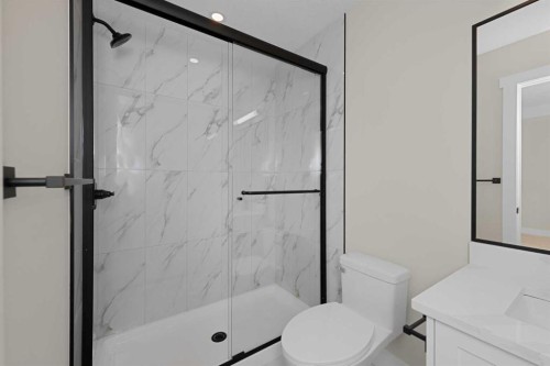500 Rivercrest View, Cochrane, AB - Indoor Photo Showing Bathroom