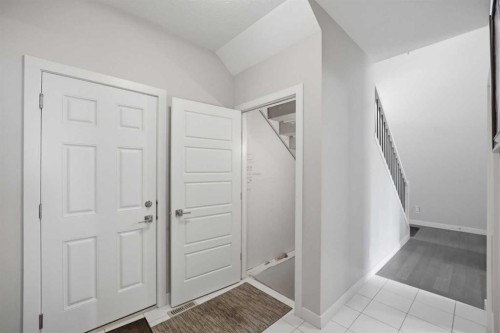 52 Sunrise Way, Cochrane, AB - Indoor Photo Showing Other Room
