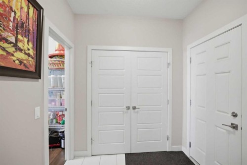 52 Sunrise Way, Cochrane, AB - Indoor Photo Showing Other Room