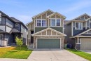 52 Sunrise Way, Cochrane, AB  - Outdoor With Facade 