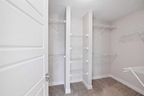 52 Sunrise Way, Cochrane, AB - Indoor With Storage