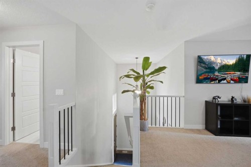 52 Sunrise Way, Cochrane, AB - Indoor Photo Showing Other Room