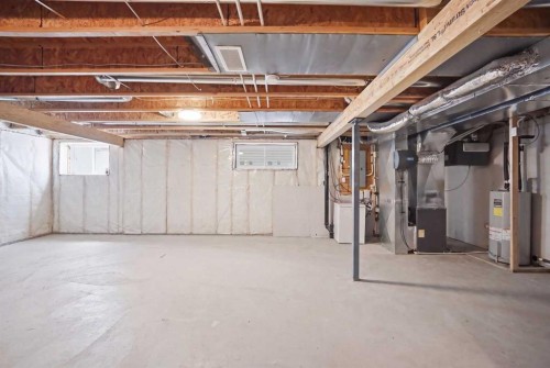 52 Sunrise Way, Cochrane, AB - Indoor Photo Showing Basement