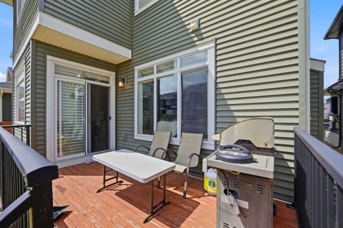52 Sunrise Way, Cochrane, AB - Outdoor With Exterior