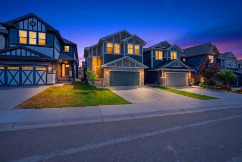 52 Sunrise Way, Cochrane, AB - Outdoor With Facade