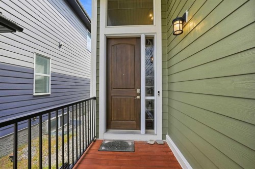 52 Sunrise Way, Cochrane, AB - Outdoor With Exterior