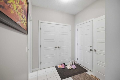 52 Sunrise Way, Cochrane, AB - Indoor Photo Showing Other Room