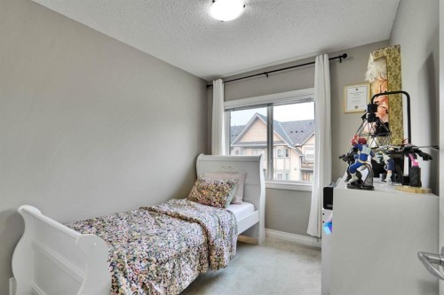 199 Cedarwood Lane Sw, Calgary, AB - Indoor Photo Showing Bedroom