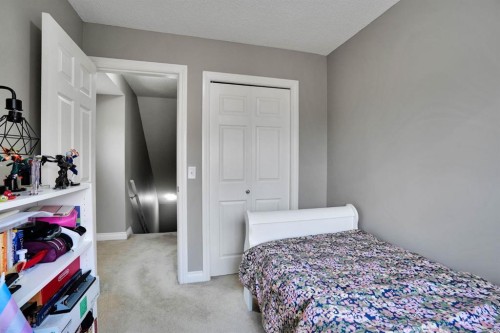 199 Cedarwood Lane Sw, Calgary, AB - Indoor Photo Showing Bedroom