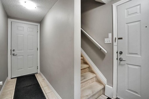 199 Cedarwood Lane Sw, Calgary, AB - Indoor Photo Showing Other Room