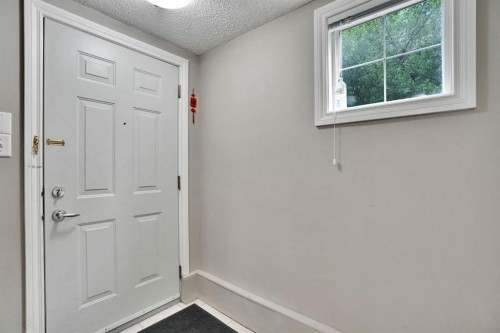 199 Cedarwood Lane Sw, Calgary, AB - Indoor Photo Showing Other Room