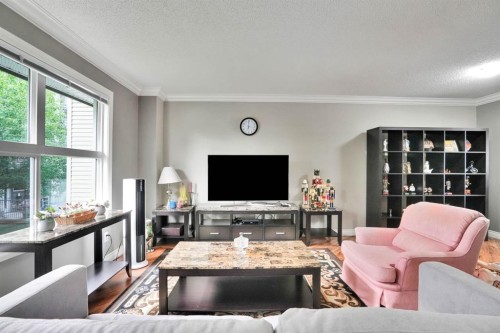 199 Cedarwood Lane Sw, Calgary, AB - Indoor Photo Showing Living Room