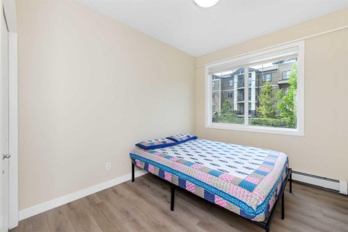 108-22 Panatella Road Nw, Calgary, AB - Indoor Photo Showing Bedroom