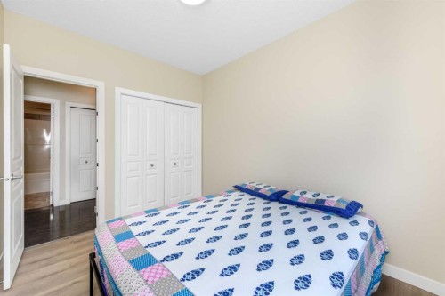 108-22 Panatella Road Nw, Calgary, AB - Indoor Photo Showing Bedroom