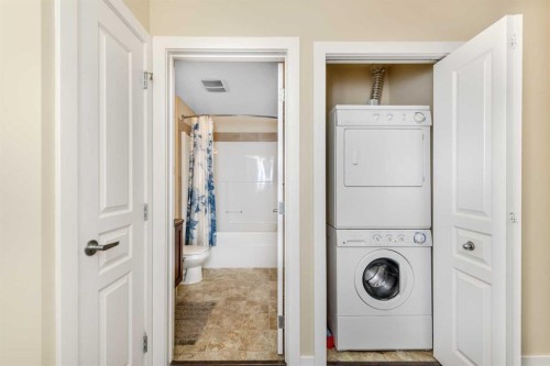 108-22 Panatella Road Nw, Calgary, AB - Indoor Photo Showing Laundry Room