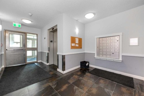 108-22 Panatella Road Nw, Calgary, AB - Indoor Photo Showing Other Room