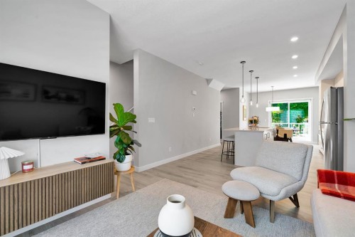 426 Shawnee Square Sw, Calgary, AB - Indoor Photo Showing Living Room