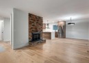 6460 Silver Ridge Way Nw, Calgary, AB  - Indoor Photo Showing Living Room With Fireplace 