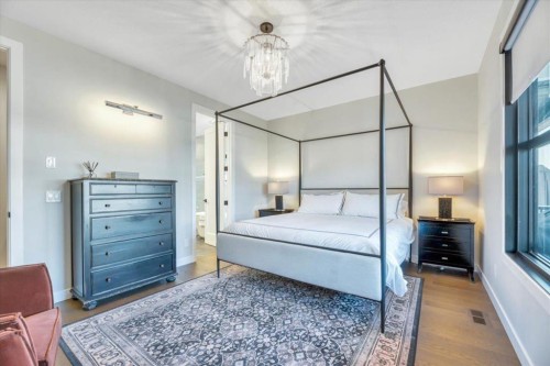 648 Shawnee Terrace Sw, Calgary, AB - Indoor Photo Showing Bedroom
