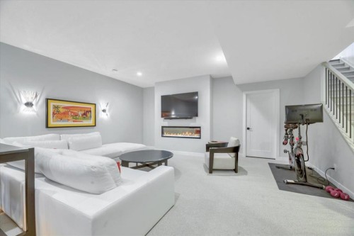 648 Shawnee Terrace Sw, Calgary, AB - Indoor With Fireplace