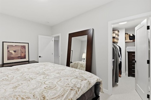 648 Shawnee Terrace Sw, Calgary, AB - Indoor Photo Showing Bedroom