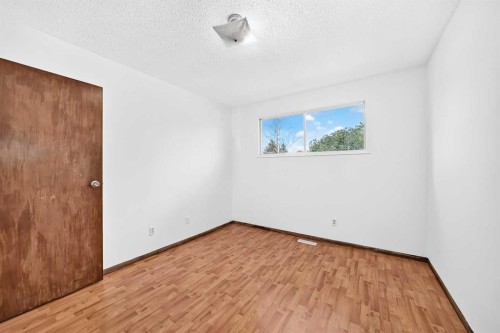 148 Fonda Drive Se, Calgary, AB - Indoor Photo Showing Other Room