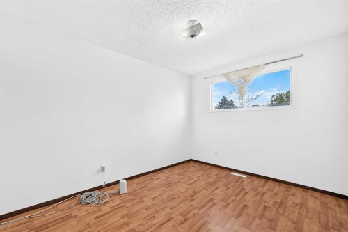148 Fonda Drive Se, Calgary, AB - Indoor Photo Showing Other Room