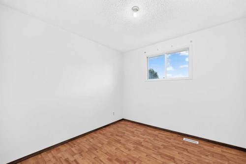 148 Fonda Drive Se, Calgary, AB - Indoor Photo Showing Other Room