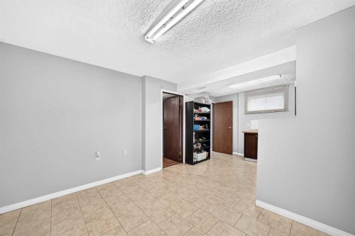 148 Fonda Drive Se, Calgary, AB - Indoor Photo Showing Other Room