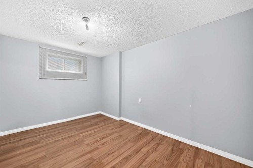 148 Fonda Drive Se, Calgary, AB - Indoor Photo Showing Other Room