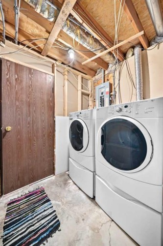 148 Fonda Drive Se, Calgary, AB - Indoor Photo Showing Laundry Room