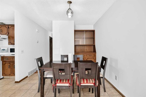148 Fonda Drive Se, Calgary, AB - Indoor Photo Showing Dining Room