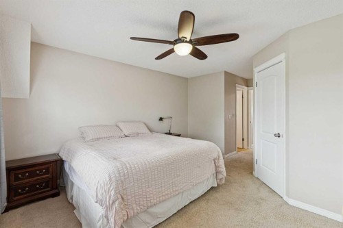 1857 New Brighton Drive Se, Calgary, AB - Indoor Photo Showing Bedroom