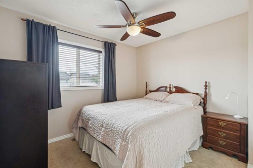 1857 New Brighton Drive Se, Calgary, AB - Indoor Photo Showing Bedroom