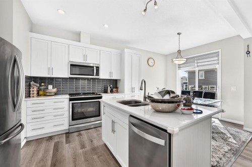 122 Cityside Way Ne, Calgary, AB - Indoor Photo Showing Kitchen With Double Sink With Upgraded Kitchen