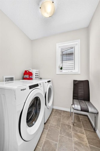 122 Cityside Way Ne, Calgary, AB - Indoor Photo Showing Laundry Room