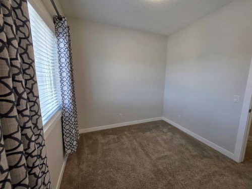 107 Lucas Boulevard Nw, Calgary, AB - Indoor Photo Showing Other Room