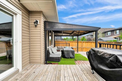 154 Buckskin Way, Cochrane, AB - Outdoor With Deck Patio Veranda With Exterior