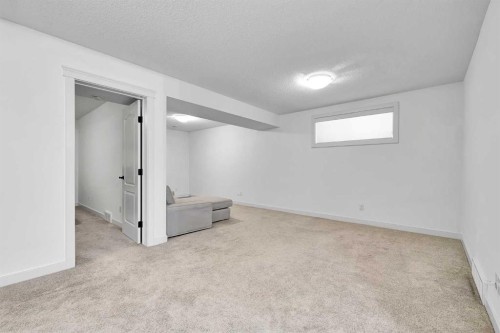 154 Buckskin Way, Cochrane, AB - Indoor Photo Showing Other Room