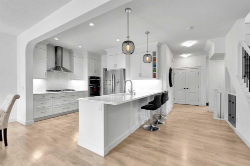 154 Buckskin Way, Cochrane, AB - Indoor Photo Showing Kitchen With Upgraded Kitchen